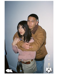a man and a woman hugging each other